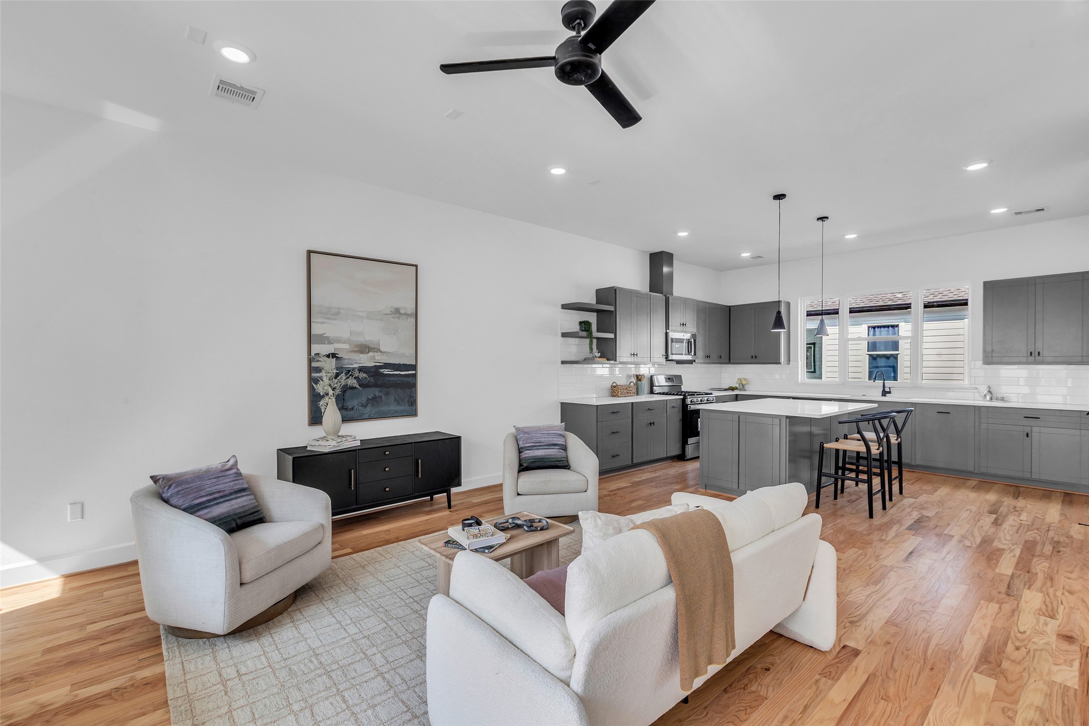 9426 Campbell Road, Unit A Houston, TX 77080 - Photo 13 of 26 a living room with furniture and kitchen view