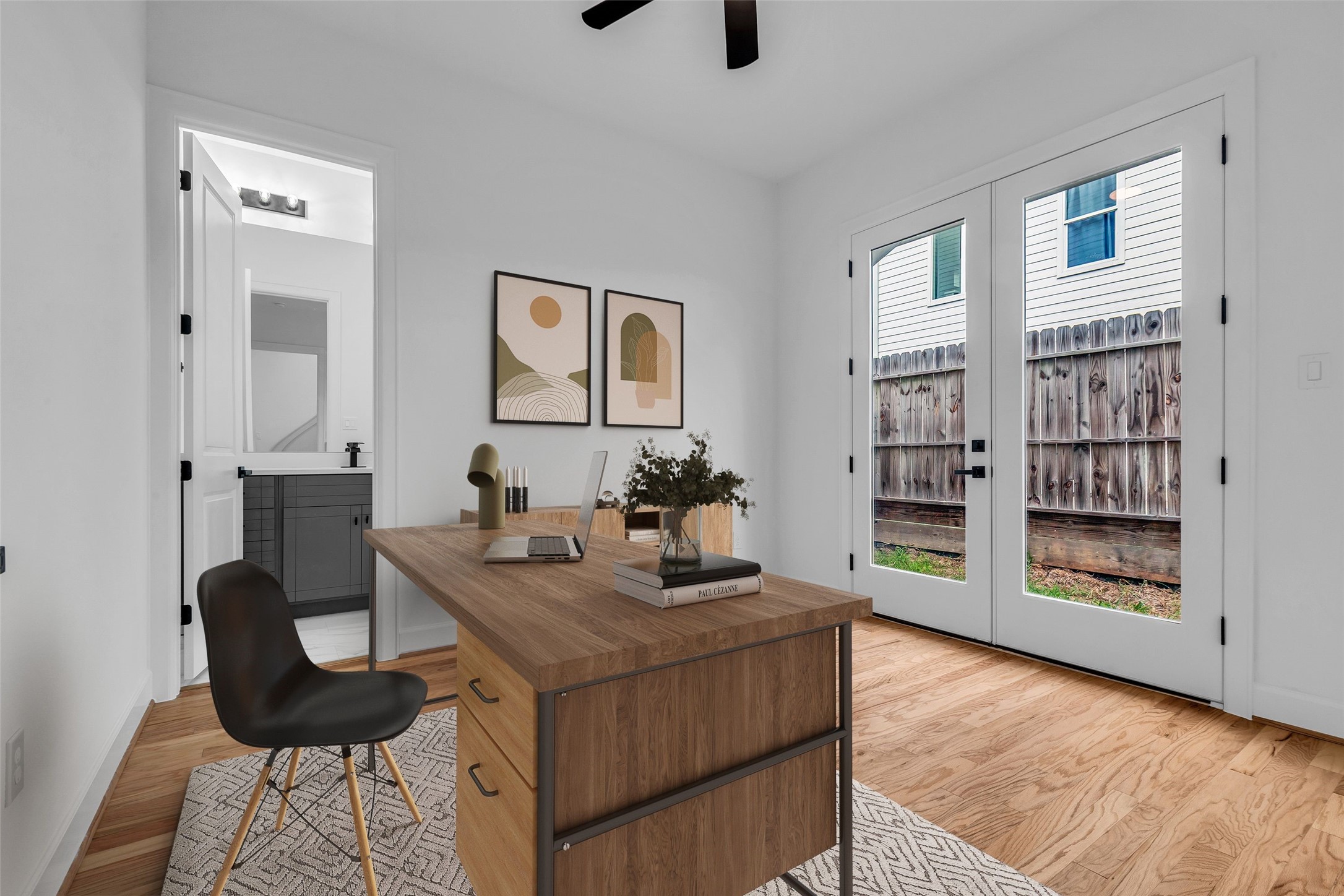 9426 Campbell Road, Unit A Houston, TX 77080 - Photo 3 of 26 a view of a workspace room with furniture and rug