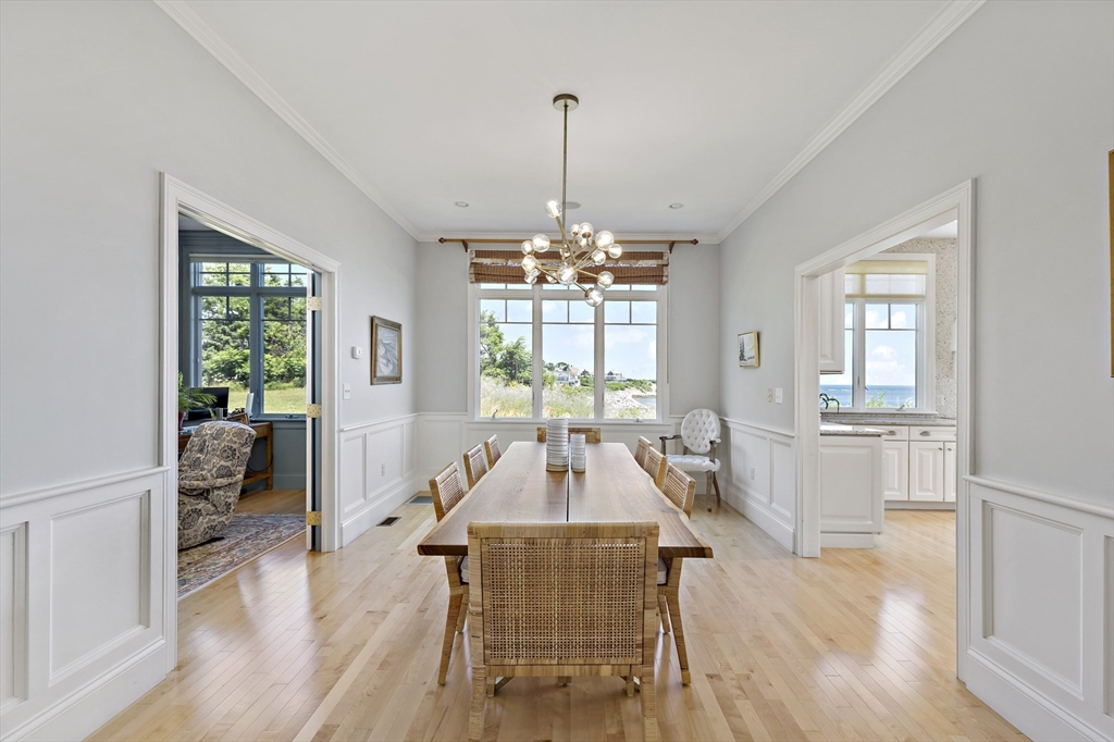135 Stage Point Road Plymouth, MA 02360 - Photo 11 of 16 a living room with furniture and a chandelier