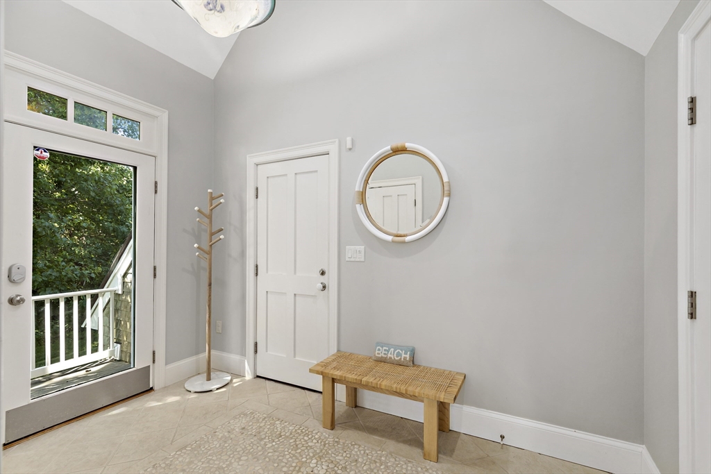 135 Stage Point Road Plymouth, MA 02360 - Photo 6 of 16 a view of a room with wooden floor and windows