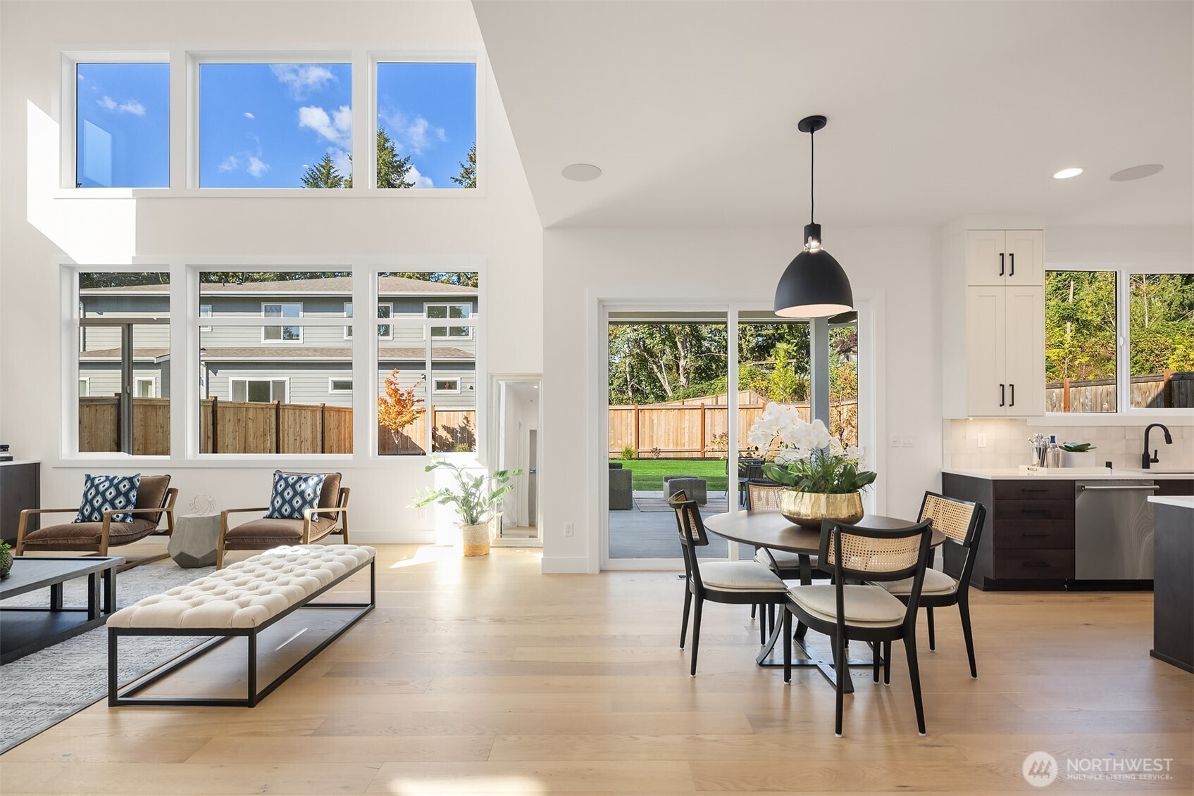 5816 Northeast 4th Place Renton, WA 98059 - Photo 14 of 25 a living room with furniture and a large window
