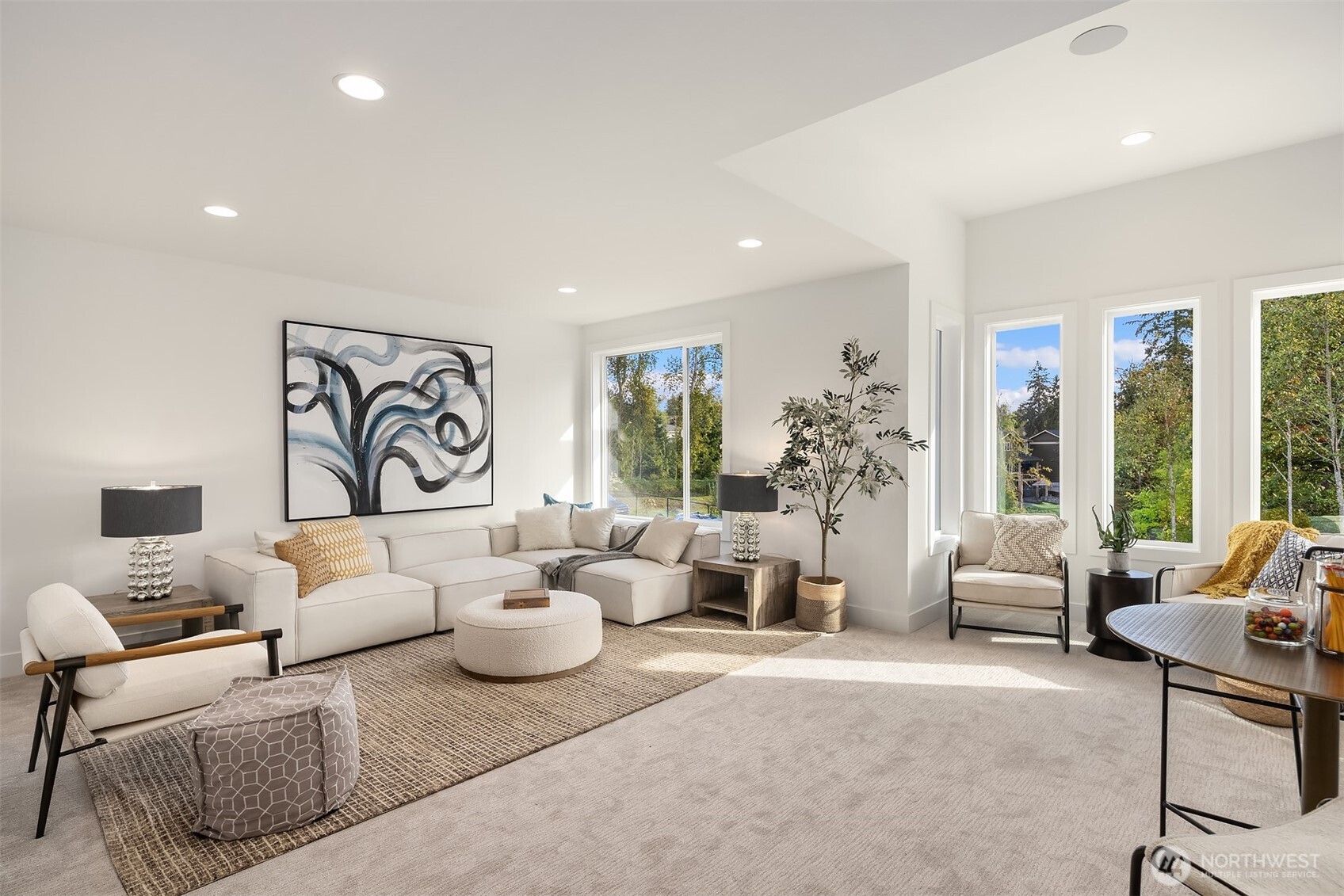 5816 Northeast 4th Place Renton, WA 98059 - Photo 18 of 25 a living room with furniture and a large window