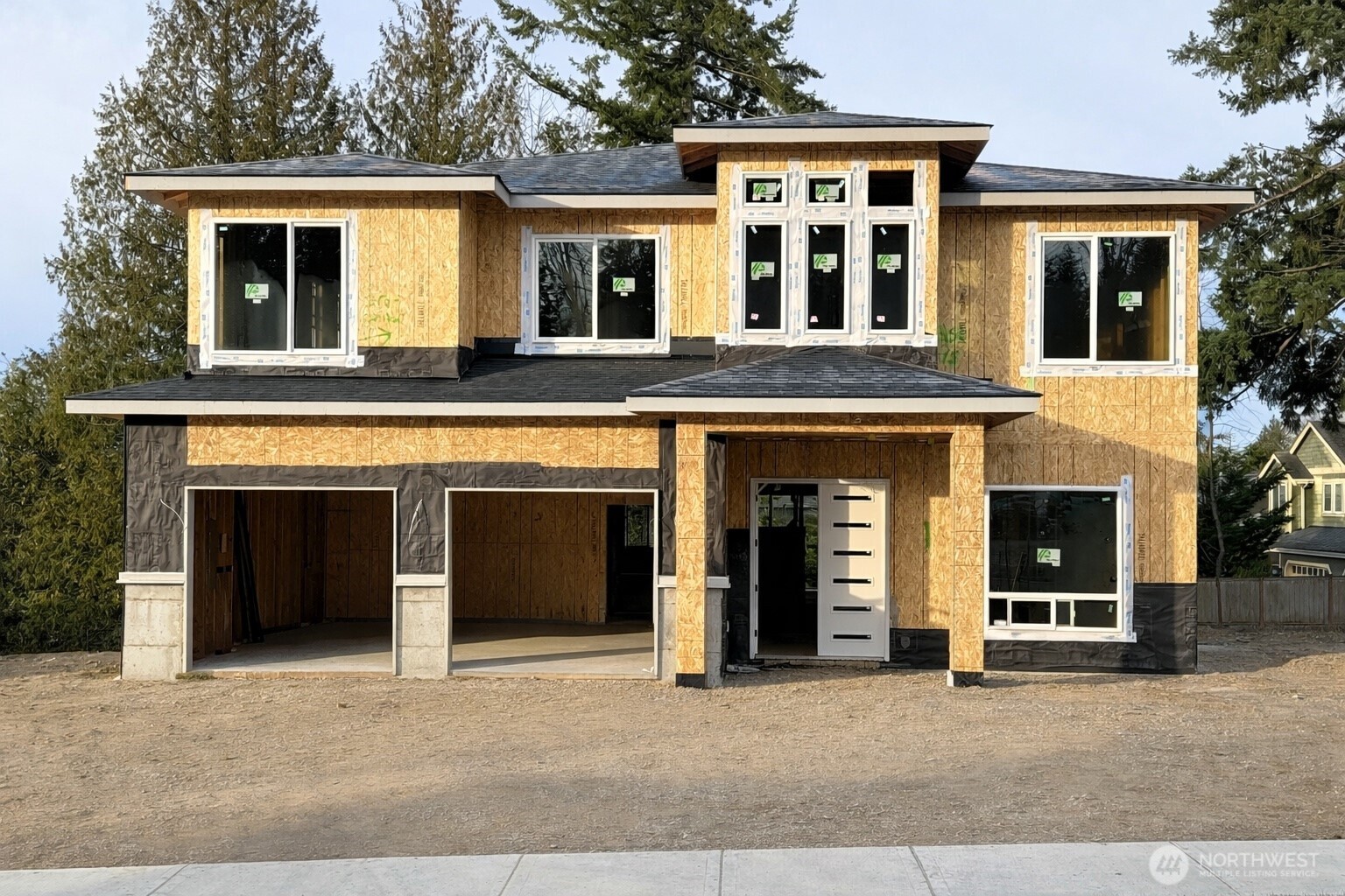 5816 Northeast 4th Place Renton, WA 98059 - Photo 2 of 25 a front view of a house with yard
