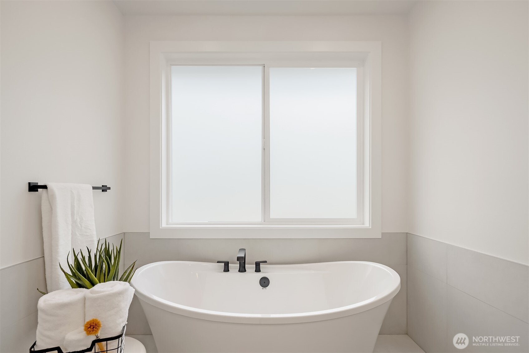 5816 Northeast 4th Place Renton, WA 98059 - Photo 22 of 25 a white bath tub sitting next to a white sink