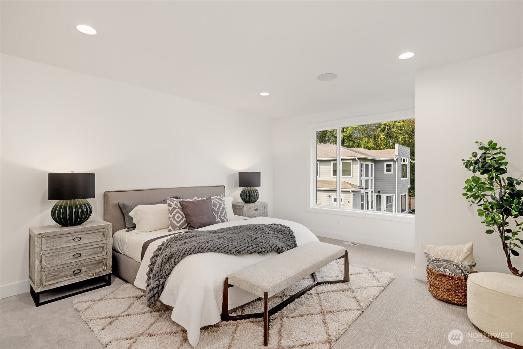 5816 Northeast 4th Place Renton, WA 98059 - Photo 23 of 25 a bedroom with a bed and a window