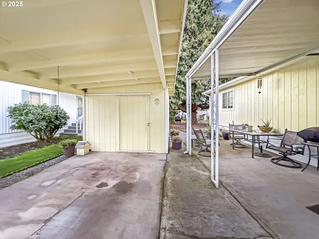 a view of a porch with seating space