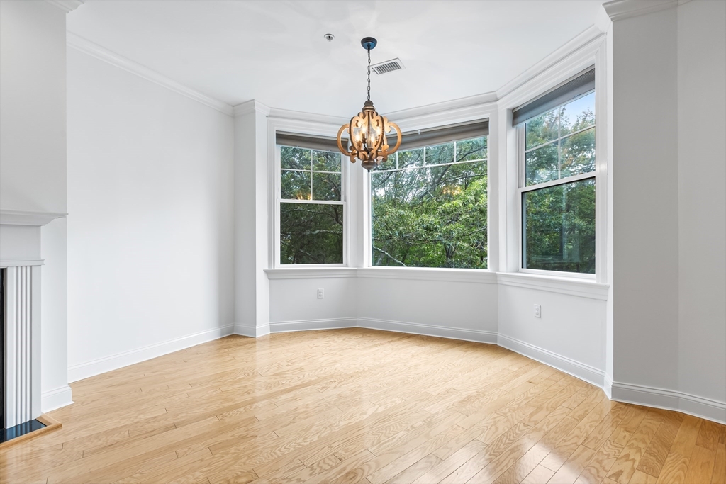 39 Taylor Drive, Unit 2006 Reading, MA 01867 - Photo 11 of 36 a view of an empty room with a window