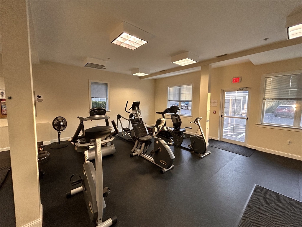 39 Taylor Drive, Unit 2006 Reading, MA 01867 - Photo 36 of 36 a view of a room with gym equipment