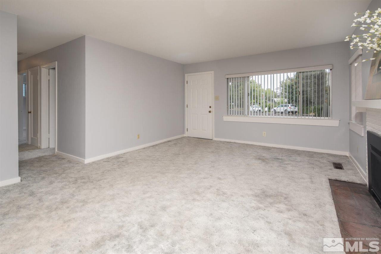 1165 Jonada Place Reno, NV 89509 - Photo 4 of 27 a view of an empty room with a window