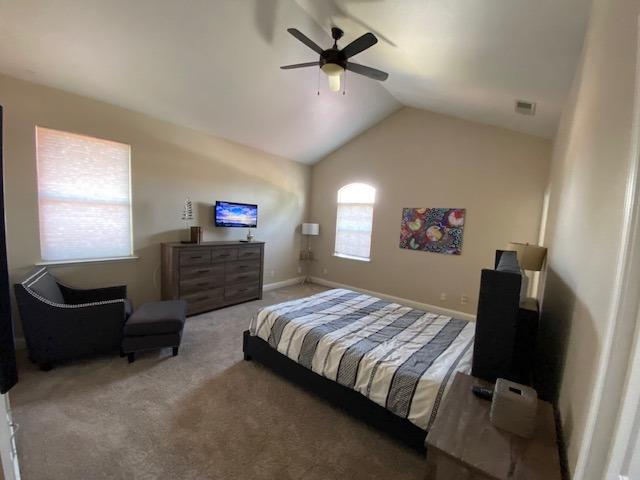 745 Haliburton Way Coalinga, CA 93210 - Photo 13 of 35 a bedroom with a bed and furniture