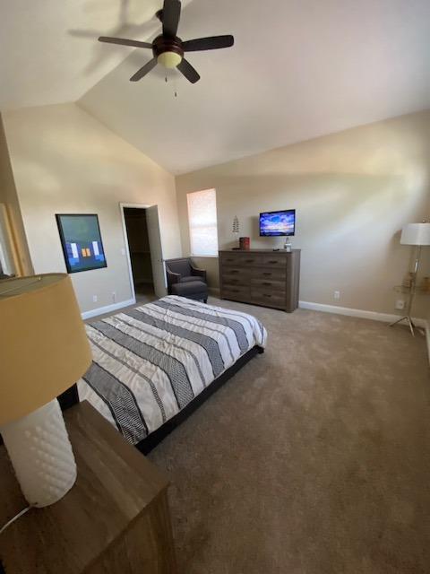 745 Haliburton Way Coalinga, CA 93210 - Photo 14 of 35 a bedroom with a bed and a tv on the dresser