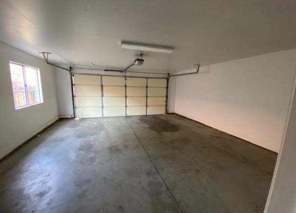 745 Haliburton Way Coalinga, CA 93210 - Photo 24 of 35 an empty room with windows and closet