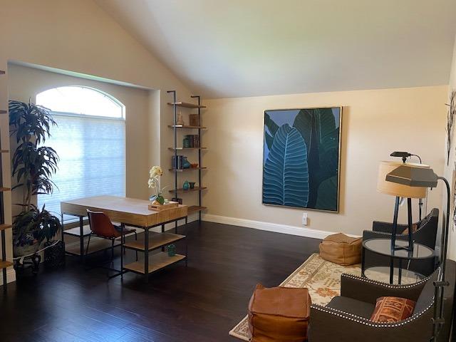 745 Haliburton Way Coalinga, CA 93210 - Photo 10 of 35 a living room with furniture and a window