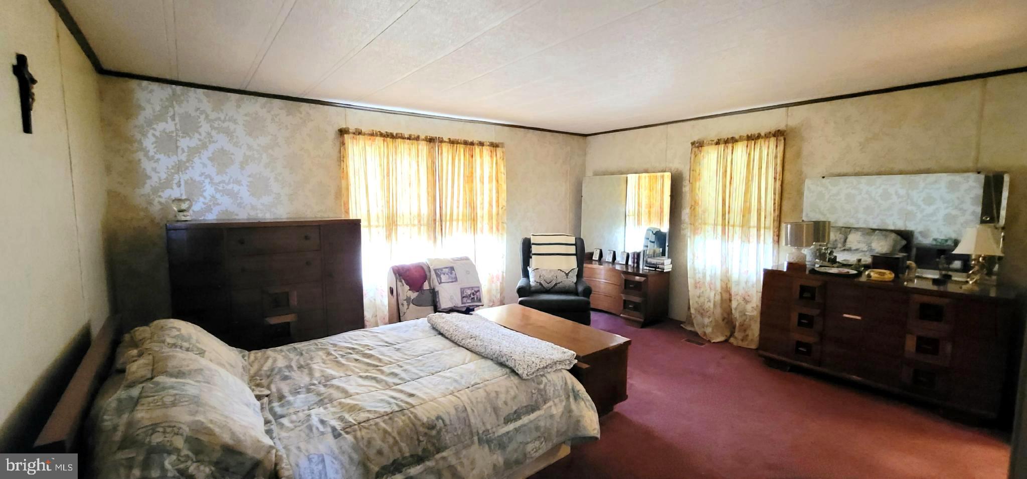 311 John Alden Drive Buena, NJ 08310 - Photo 15 of 35 a bedroom with a bed and wooden floor