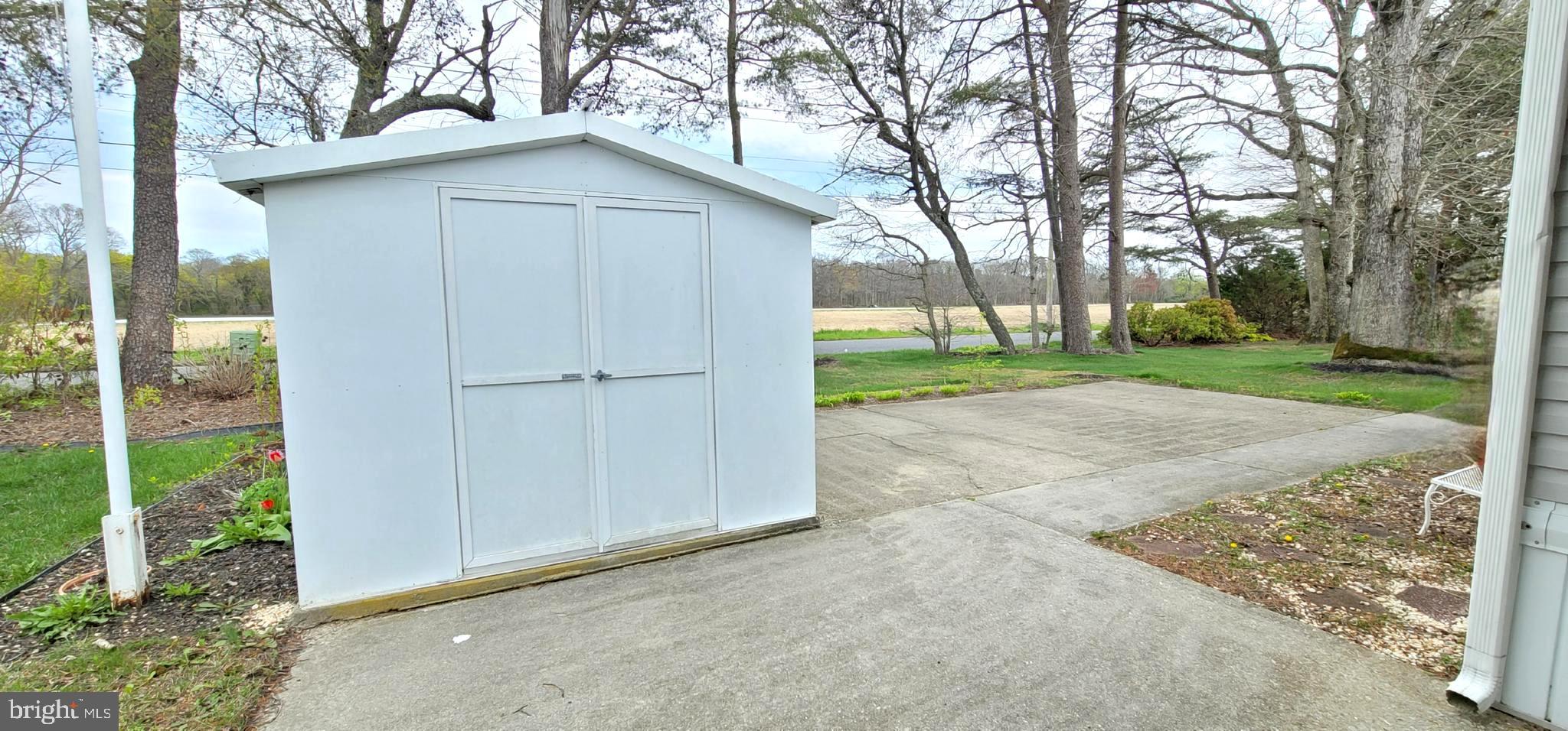 311 John Alden Drive Buena, NJ 08310 - Photo 24 of 35 a view of backyard of house with green space
