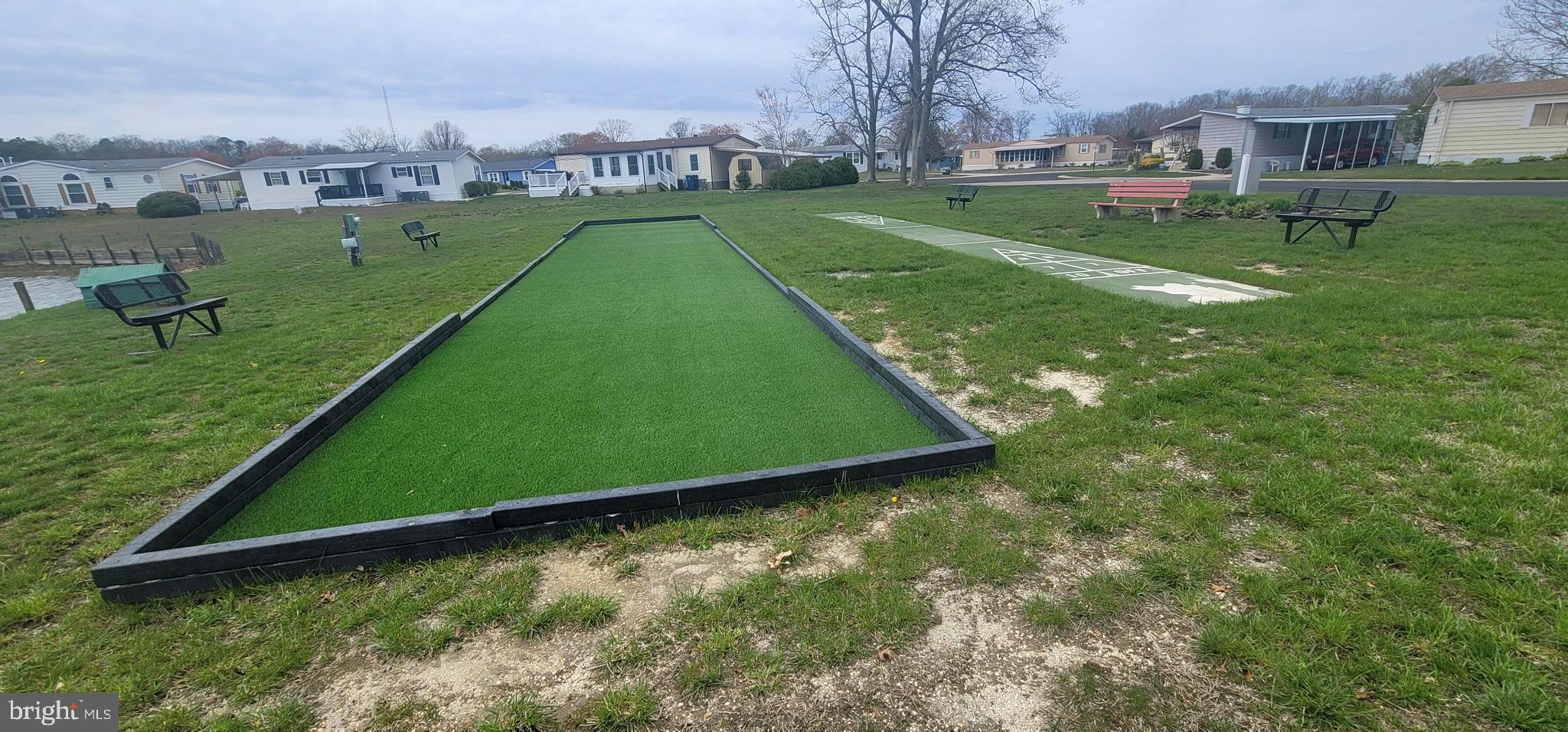 311 John Alden Drive Buena, NJ 08310 - Photo 30 of 35 an aerial view of a golf course with a lake view