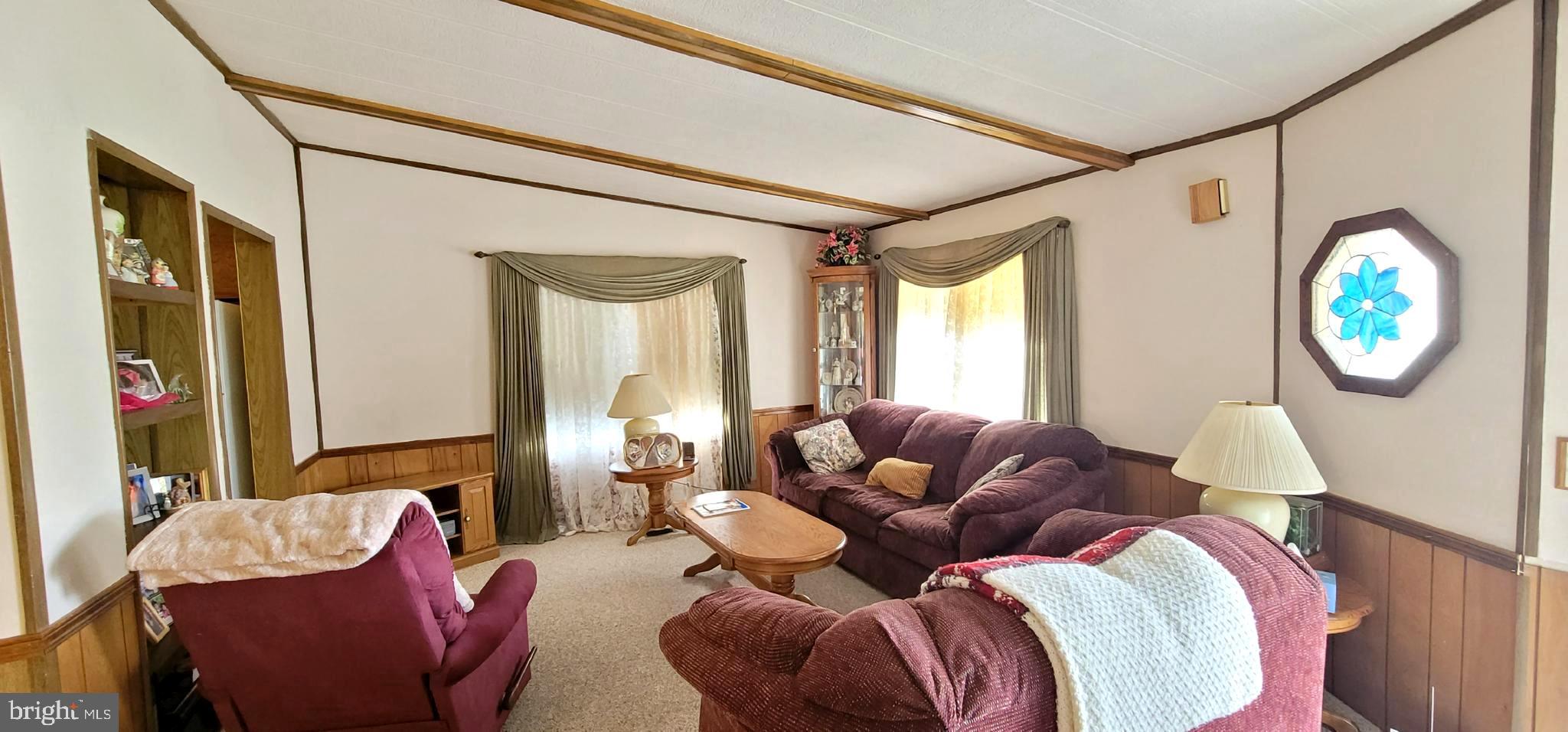 311 John Alden Drive Buena, NJ 08310 - Photo 3 of 35 a living room with furniture and a mirror