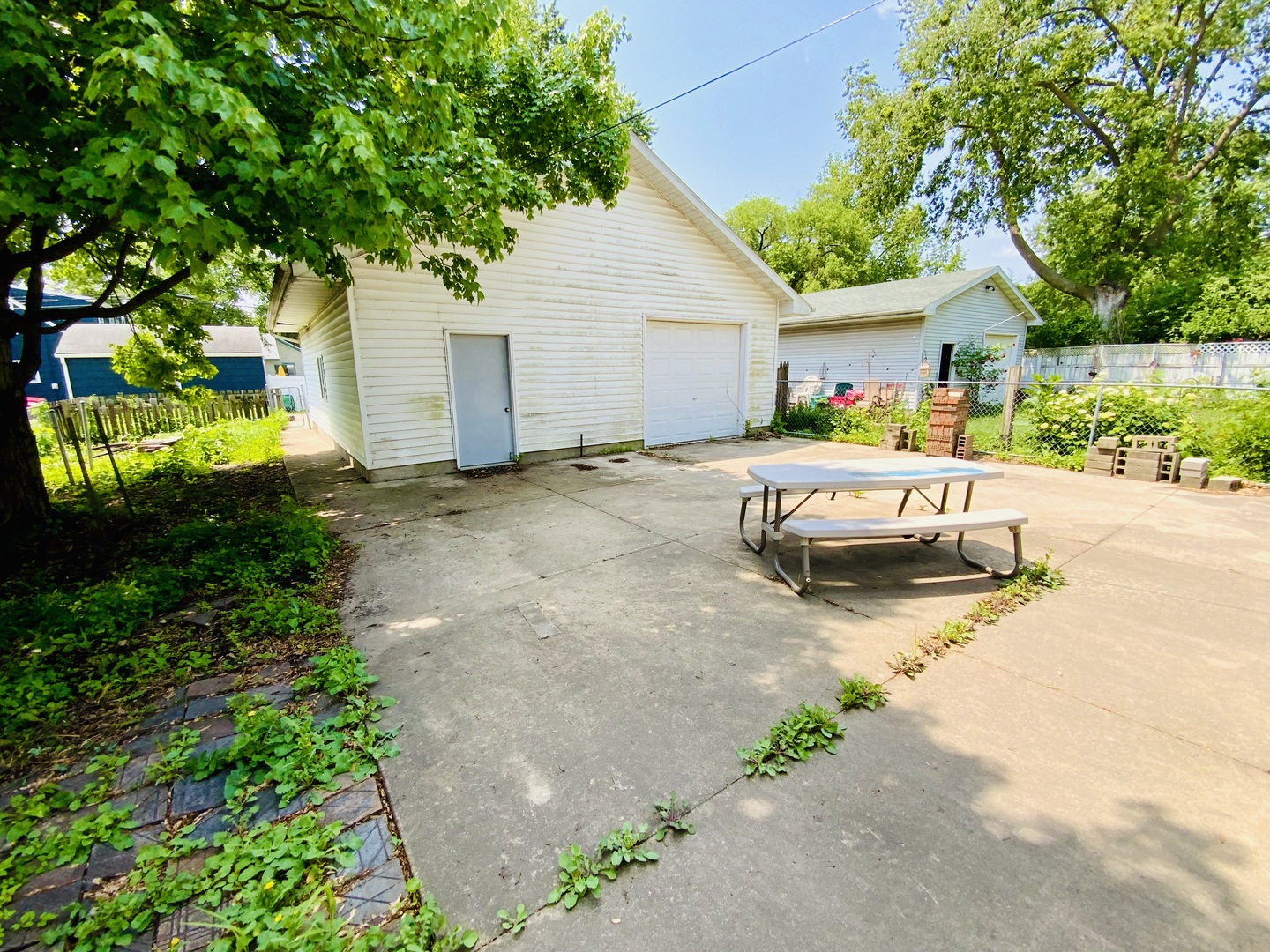 157 Prairie Street Ottawa, IL 61350 - Photo 15 of 20 a view of a house with backyard and sitting area