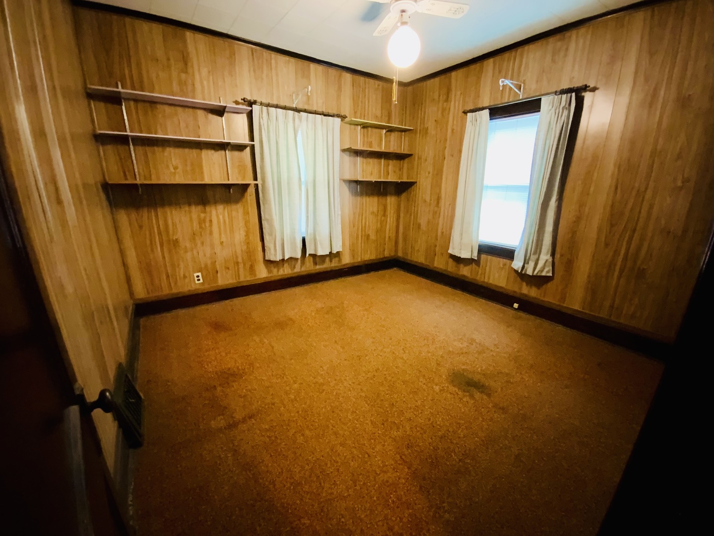 157 Prairie Street Ottawa, IL 61350 - Photo 6 of 20 a view of a room with wooden walls