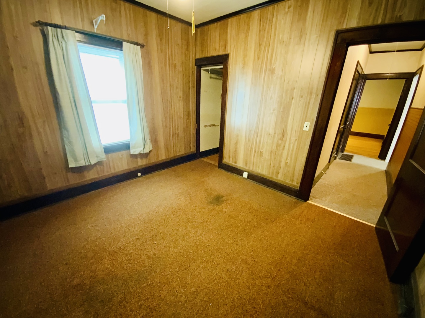 157 Prairie Street Ottawa, IL 61350 - Photo 7 of 20 a view of an empty room with a window