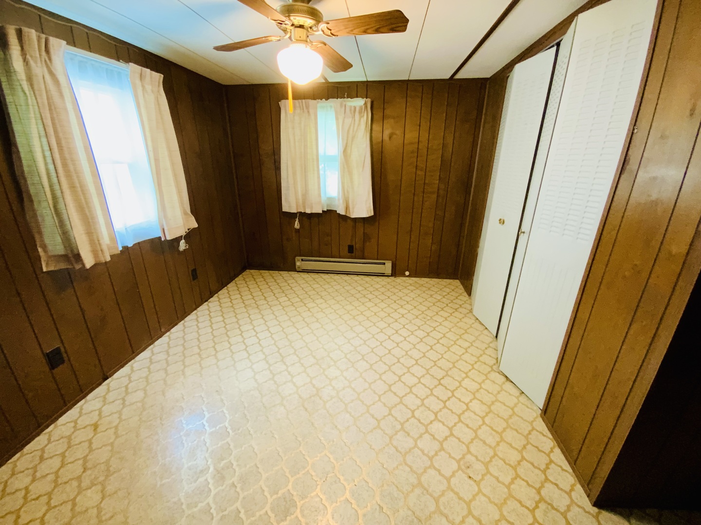 157 Prairie Street Ottawa, IL 61350 - Photo 9 of 20 a bedroom with a bed and a mirror