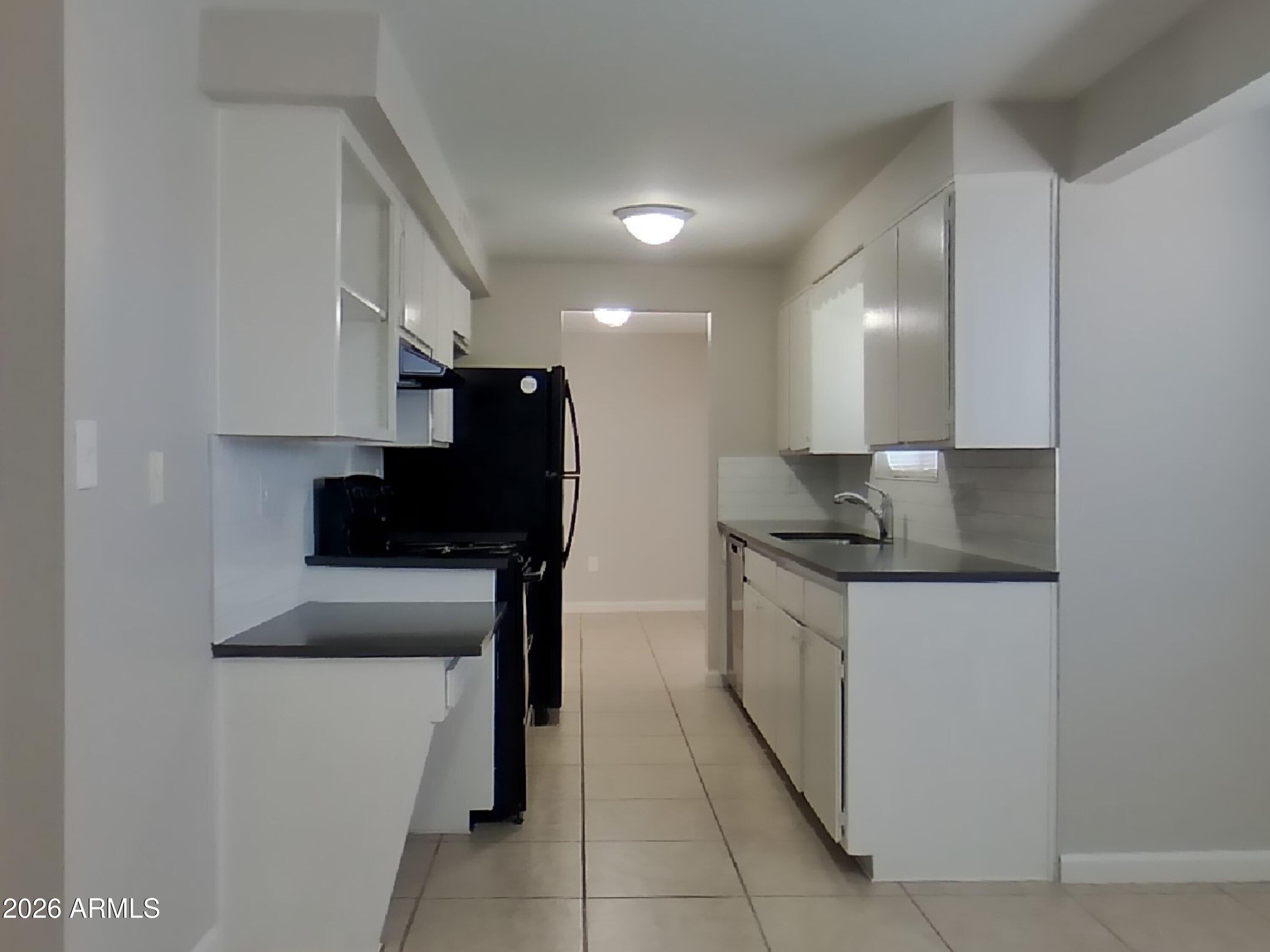 3830 West Royal Palm Road Phoenix, AZ 85051 - Photo 7 of 20 6_pc_koBJFKGF2n_HhOQTxmWHc_other_room_39