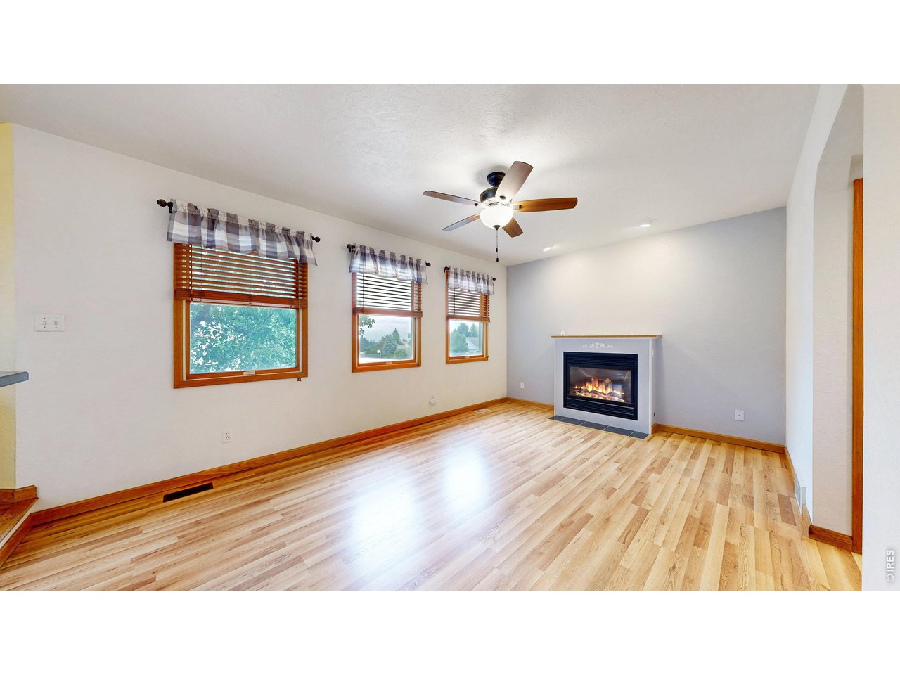 5017 West 6th Street Road Greeley, CO 80634 - Photo 11 of 42 Living room fireplace