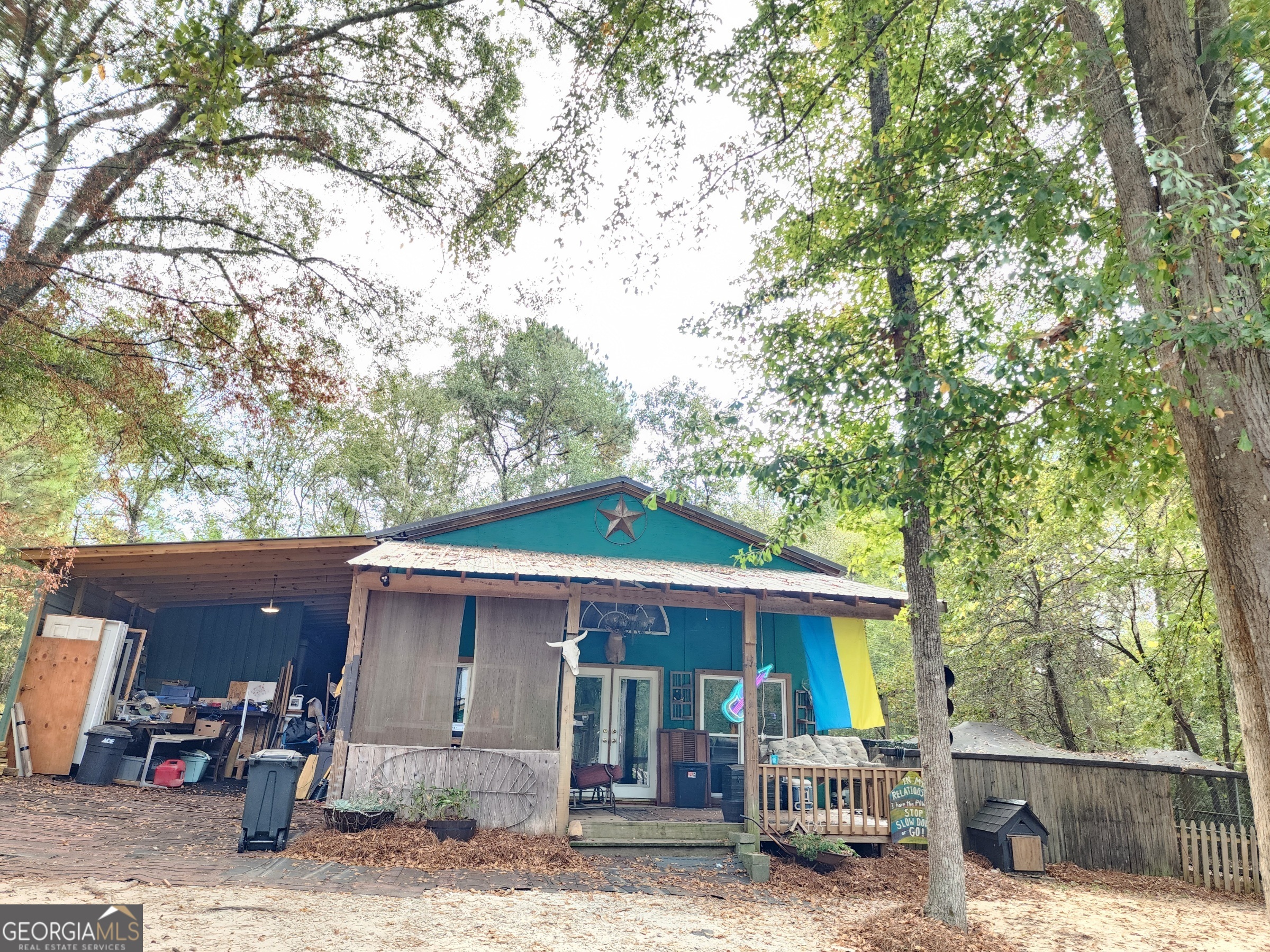 260 Old Copelan Road Southeast Eatonton, GA 31024 - Photo 65 of 88 a front view of a house with garden