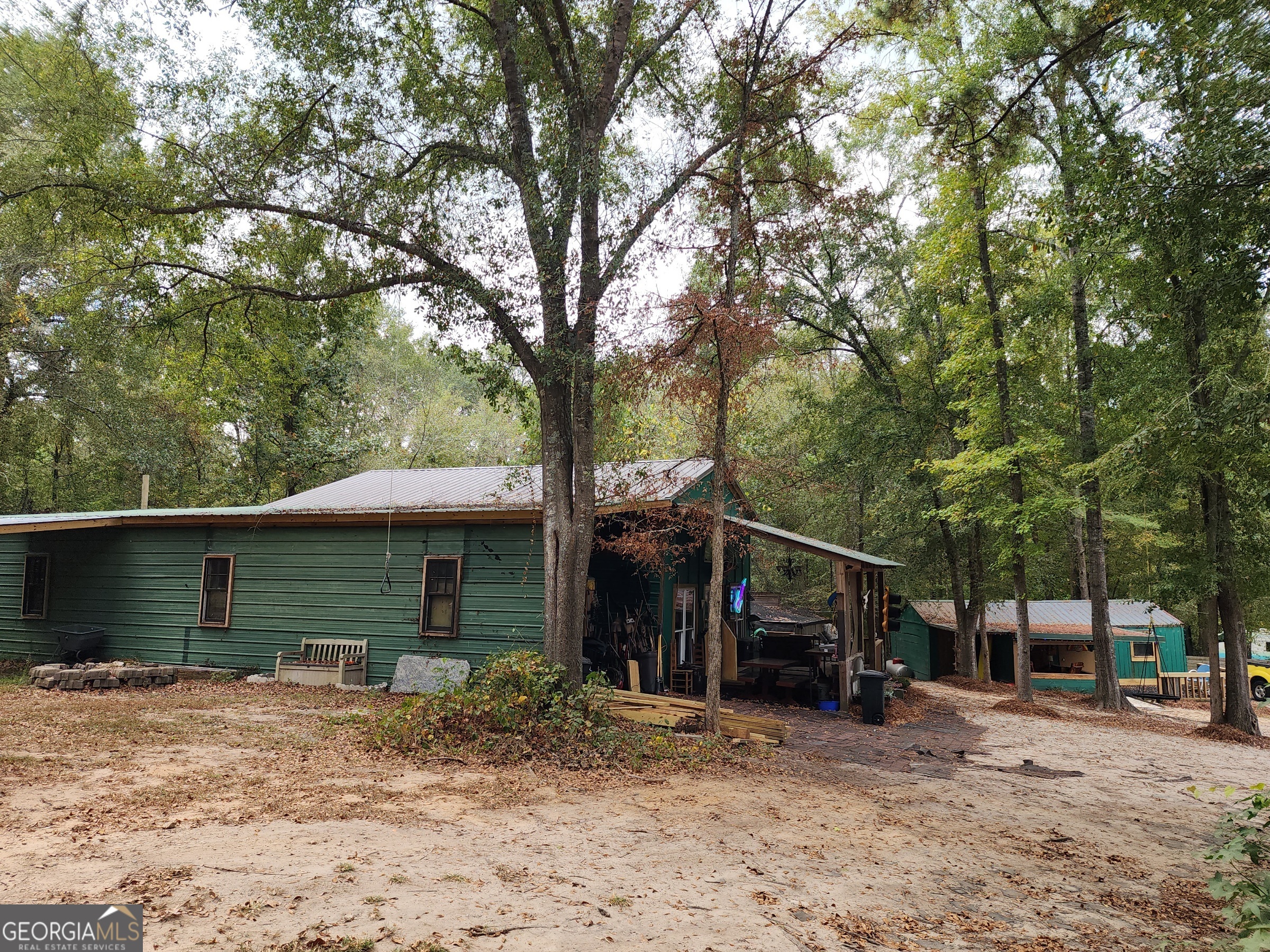 260 Old Copelan Road Southeast Eatonton, GA 31024 - Photo 66 of 88 a view of a house with a patio