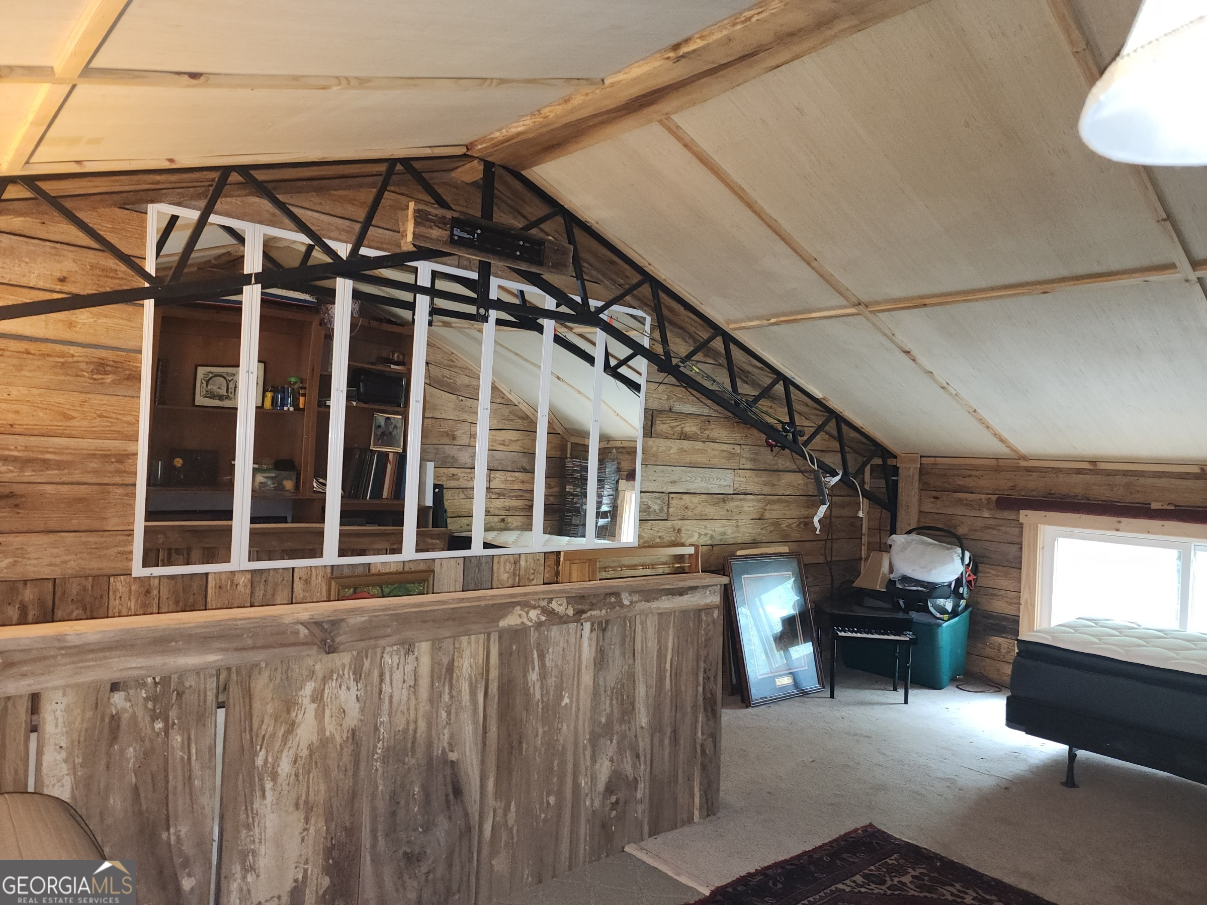 260 Old Copelan Road Southeast Eatonton, GA 31024 - Photo 74 of 88 a view of a house with a barbeque and wooden stairs