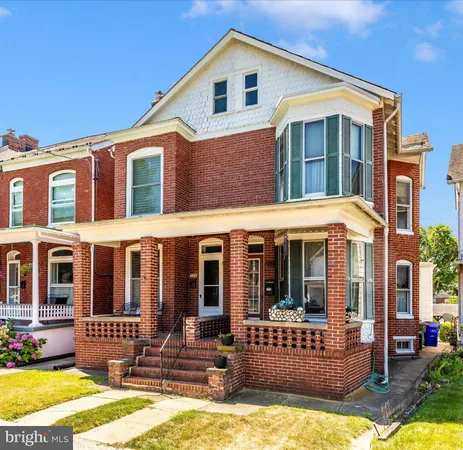 a front view of a house with a glass door