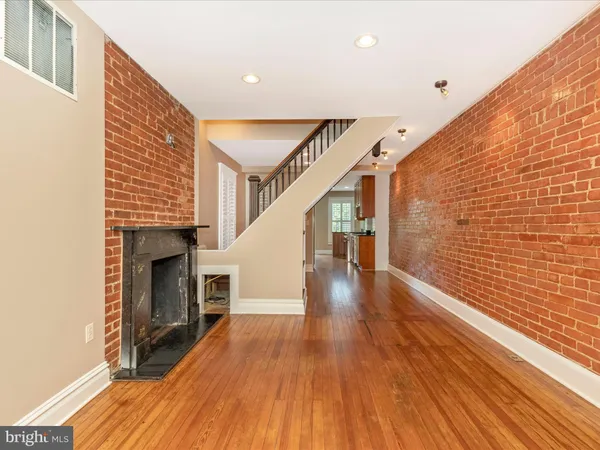 a view of entryway with wooden floor