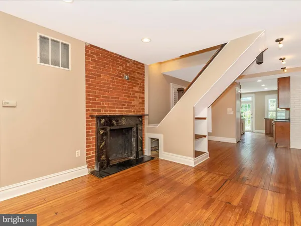 a view of balcony with wooden floor