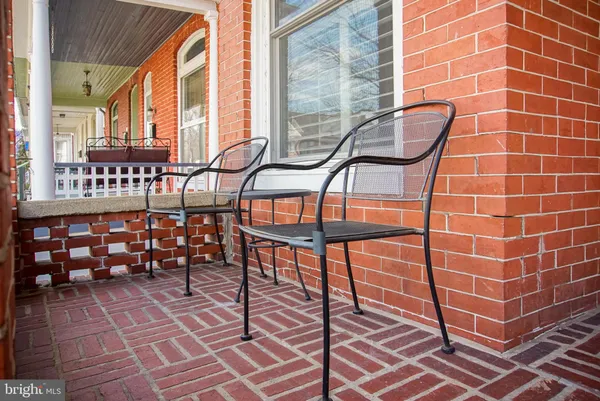 a kitchen with stainless steel appliances a stove and a refrigerator