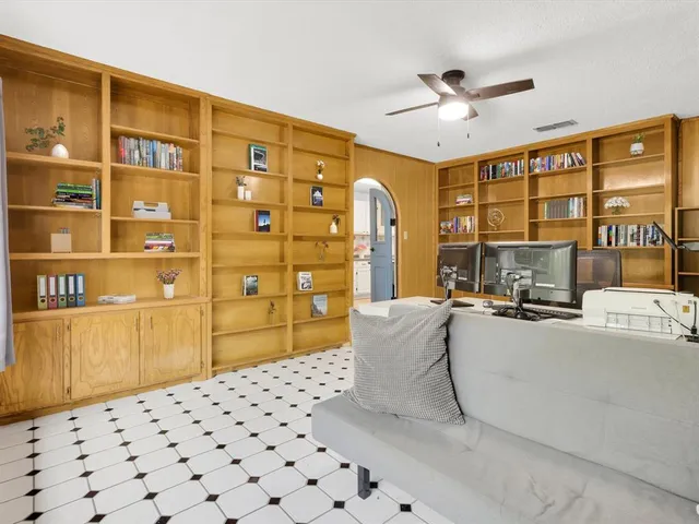 a view of a dining room with furniture and window