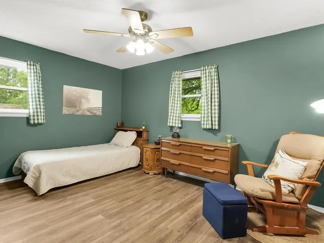 a bathroom with a sink and a window