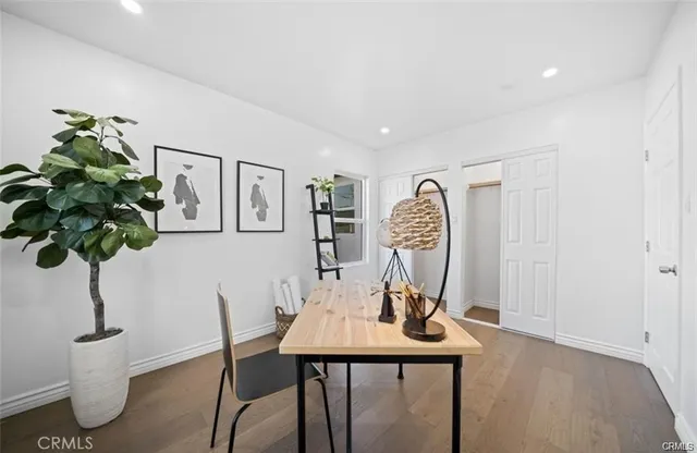 a view of a workspace with furniture