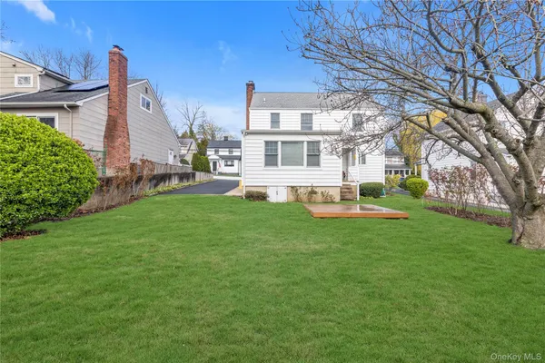 a view of a house with a big yard