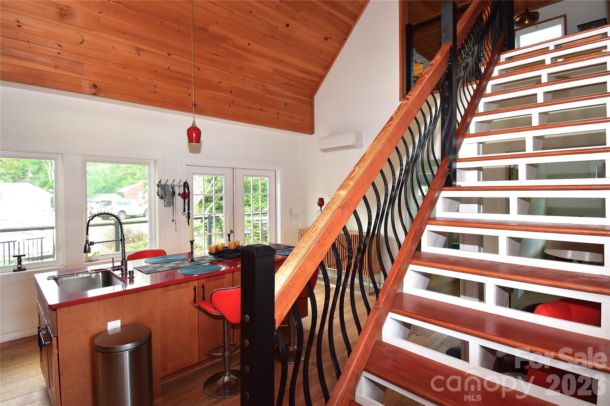 6 Belvedere Road Asheville, NC 28803 - Photo 13 of 33 a dinning room with wooden floor and furniture