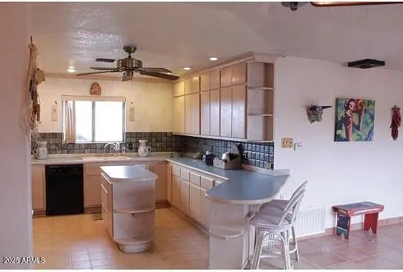 a living room with lots of furniture and a chandelier