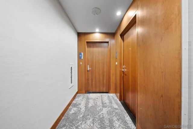 a view of hallway with livingroom