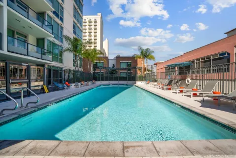 a view of a street with a building in the background