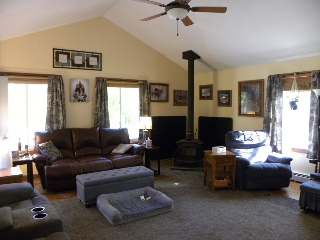 360 Coldbrook Road Oakham, MA 01068 - Photo 15 of 28 a living room with furniture and a window