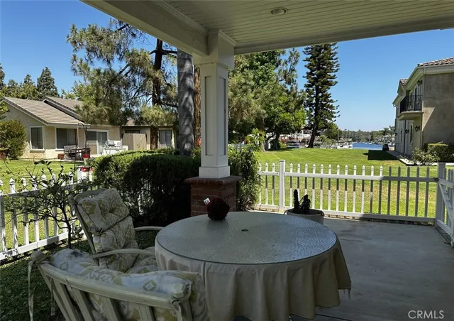 a kitchen with granite countertop a stove and a microwave