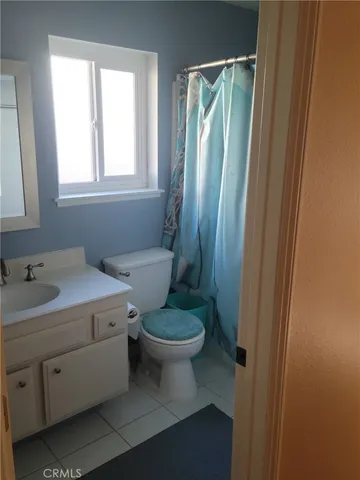 a view of a room that has a window