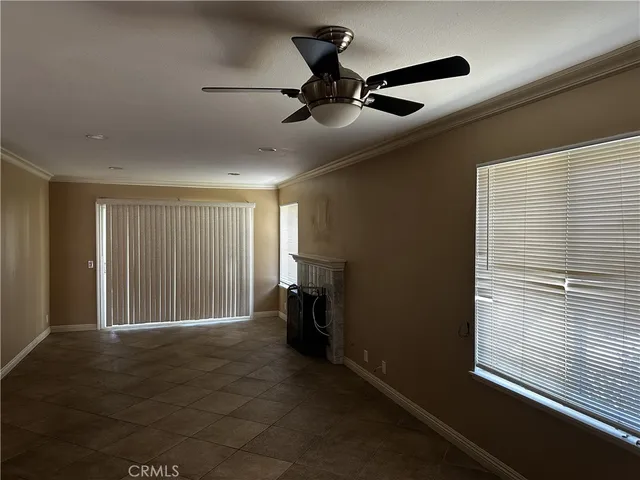 a view of a room with a large window