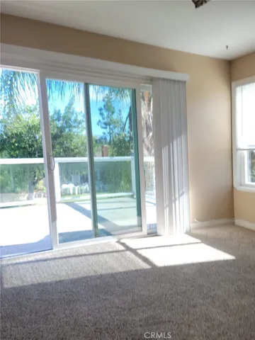 a bathroom with a toilet and shower