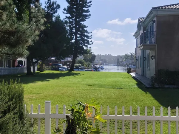 a view of a building with a yard