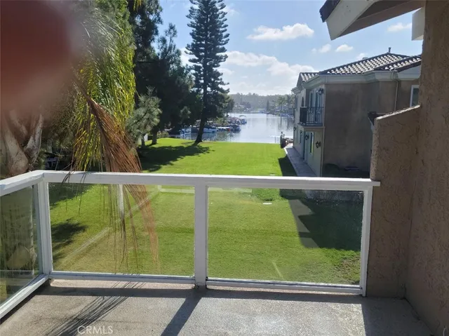 a view of swimming pool from a balcony