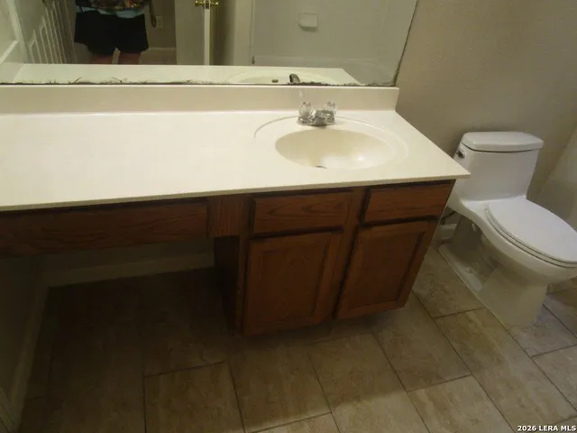 a balcony with wooden floor